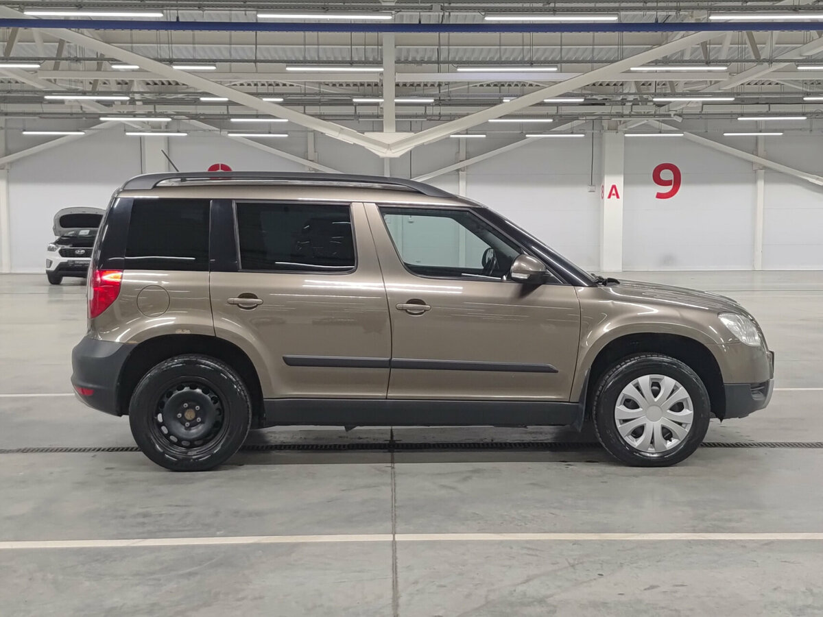 Skoda Yeti б/у, 2012, Механическая. Фото: #3