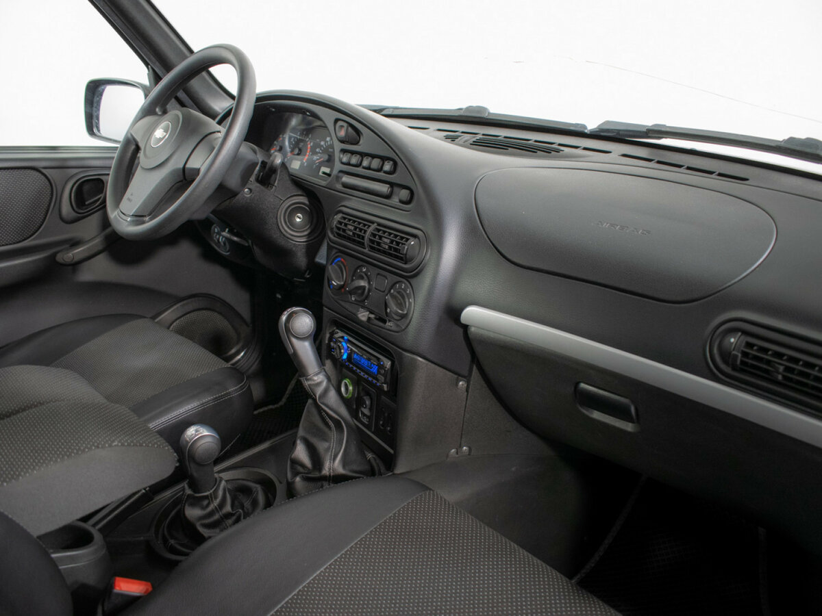 Chevrolet Niva б/у, 2012, Механическая. Фото: #6